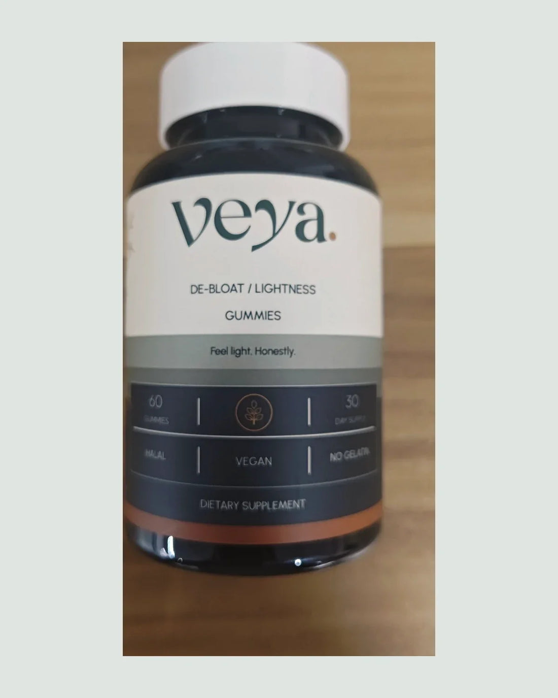 The Veya bottle, front label: de-bloat and lightness gummies, sixty gummies, thirty-day supply, halal, vegan, no gelatin.