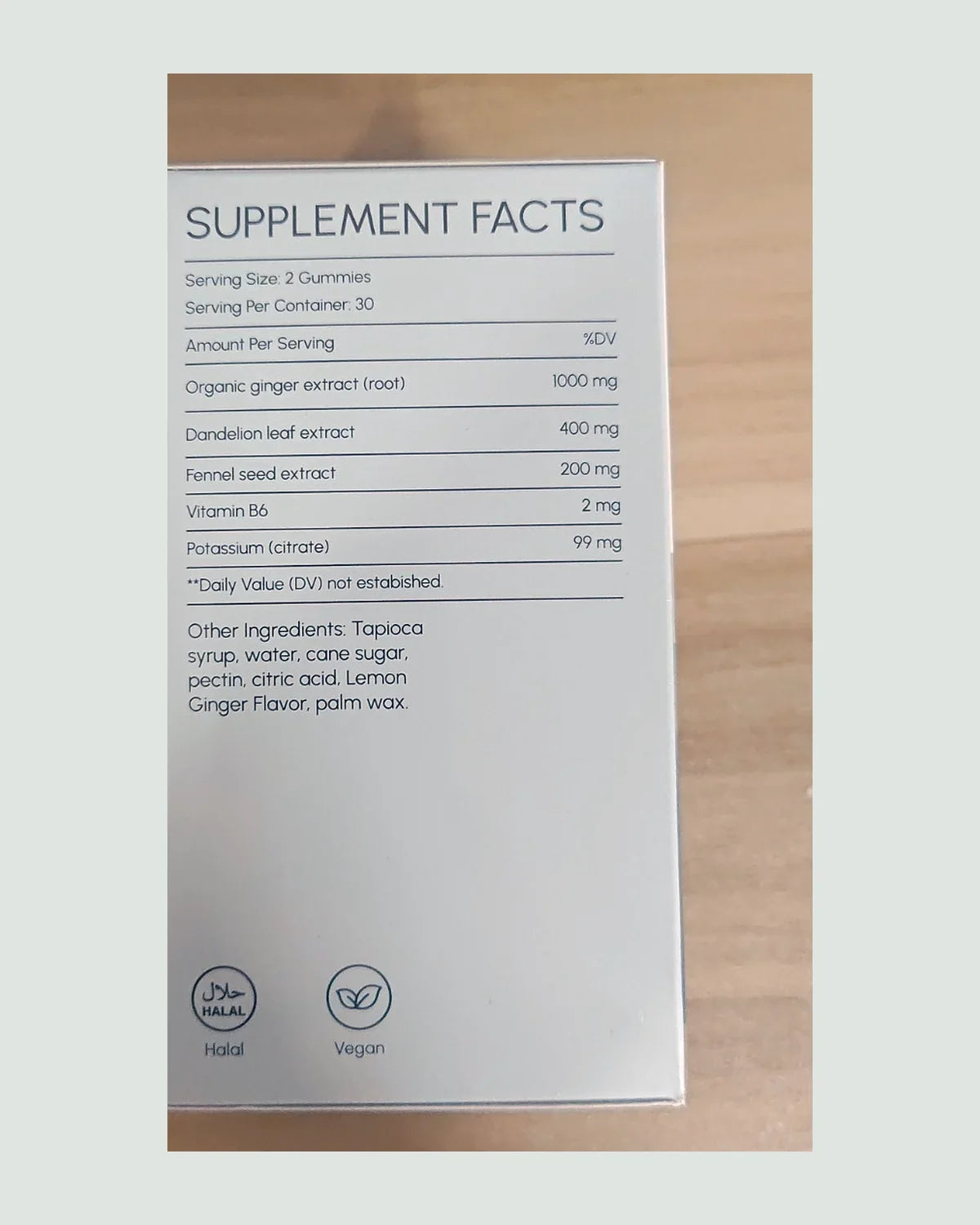 The supplement facts panel: ginger 1000 mg, dandelion leaf 400 mg, fennel seed 200 mg, vitamin B6 2 mg, potassium citrate 99 mg per two gummies.