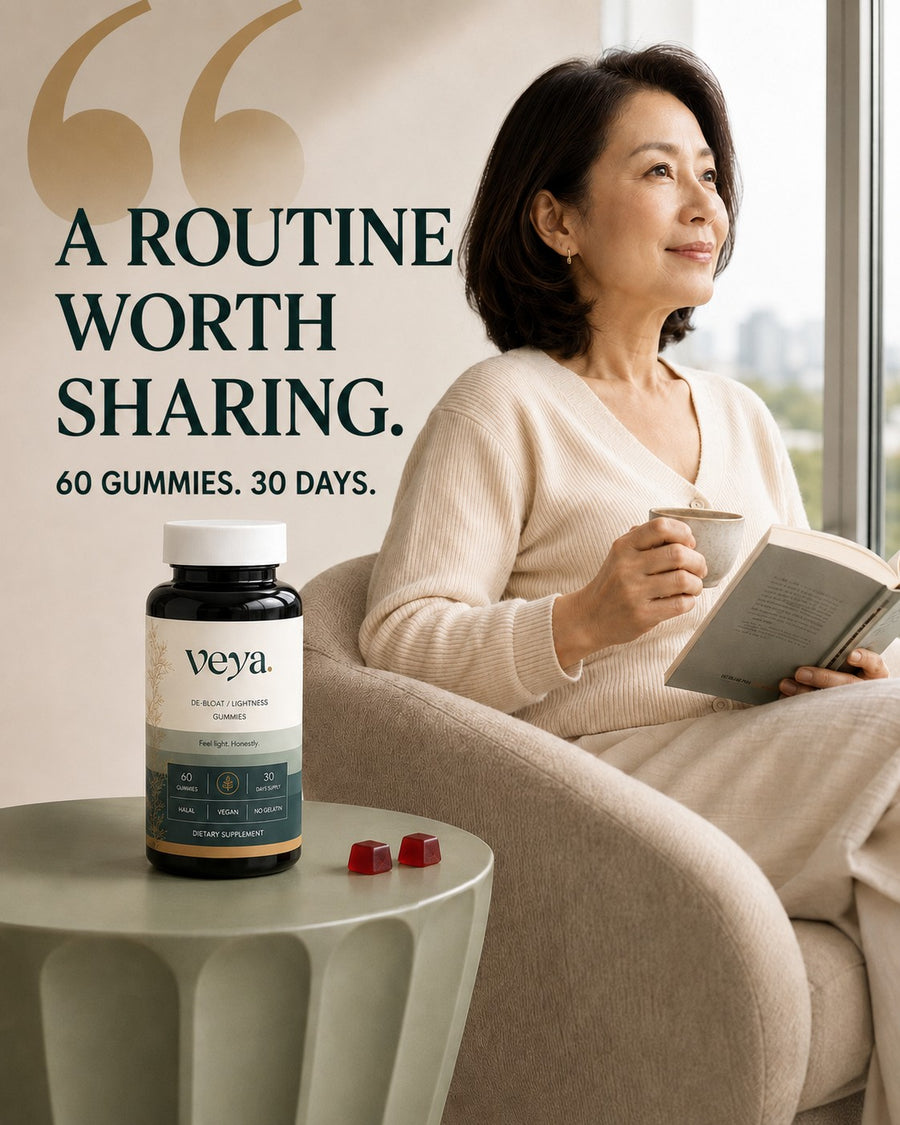 A woman reading by a window with the Veya jar beside her.