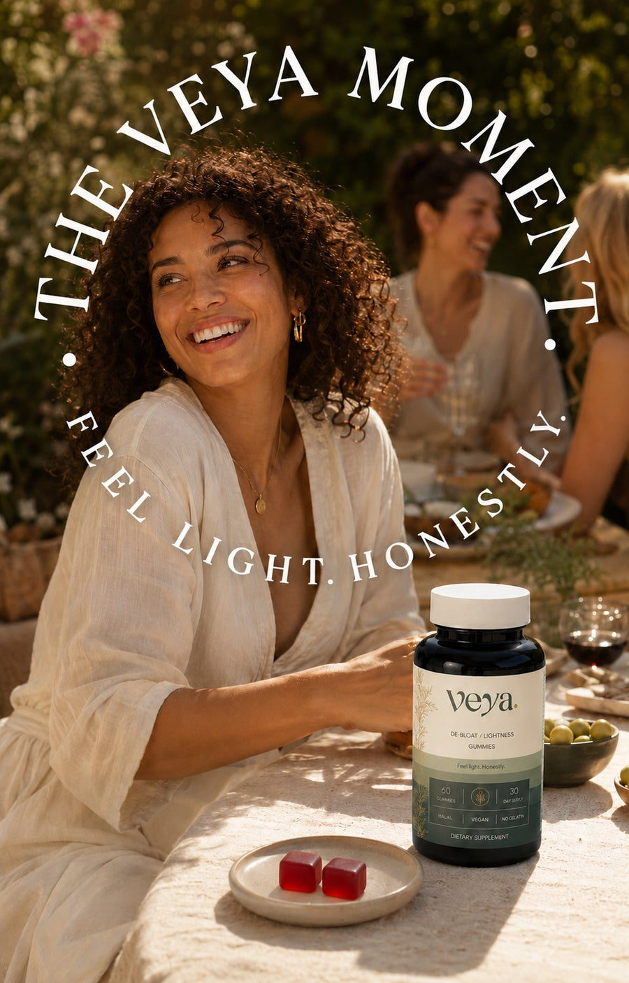 A woman at an outdoor table with the Veya jar in front.