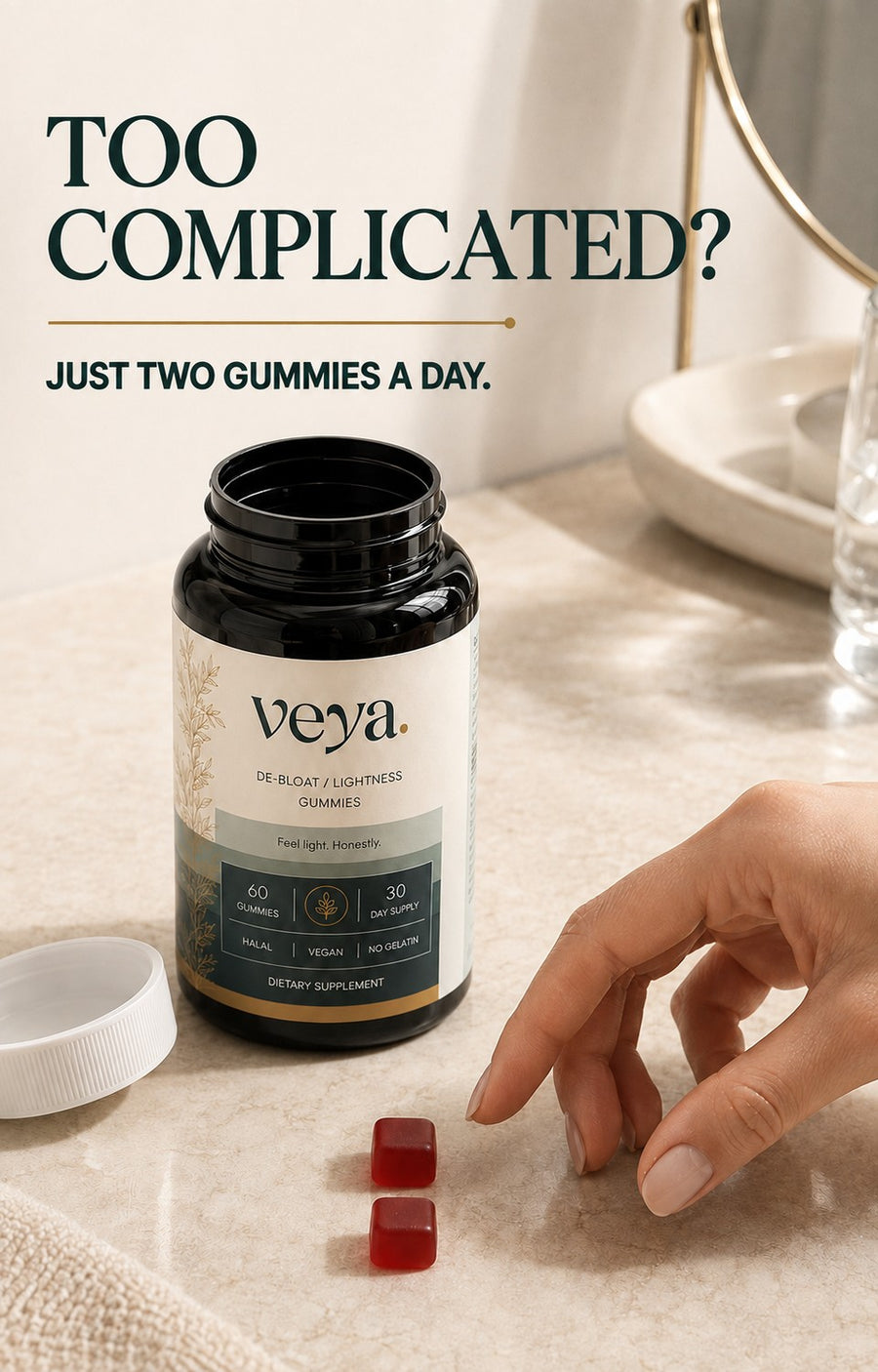 A hand reaching for two gummies beside the Veya jar.